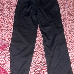 Edward’s black scrub pants